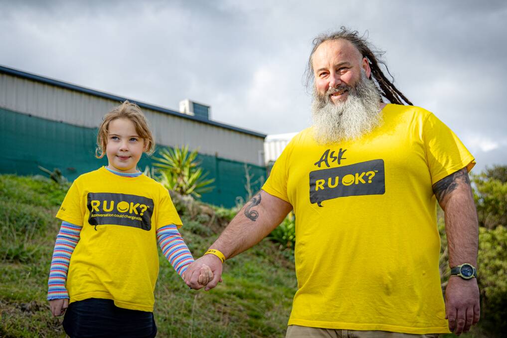 Harper, 7, and Nathan McKane are taking part in the RUOK? challenge to share the message that 'every conversation can save a life.' Picture by Eddie Guerrero