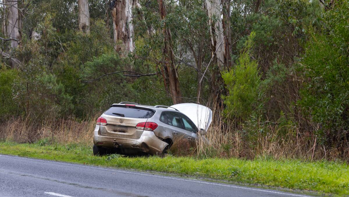 The driver of this vehicle lost control after hitting a fallen tree on the Cobden-Warrnambool Road on Monday, July 15. Picture by Eddie Guerrero