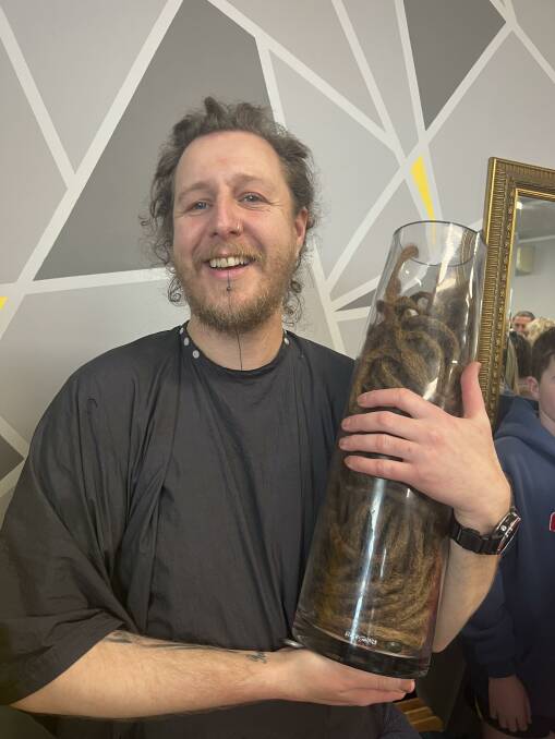Ty Dance's dreadlocks easily filled this large vase. Picture supplied
