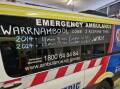 A Warrnambool ambulance is adorned with a message about response times.