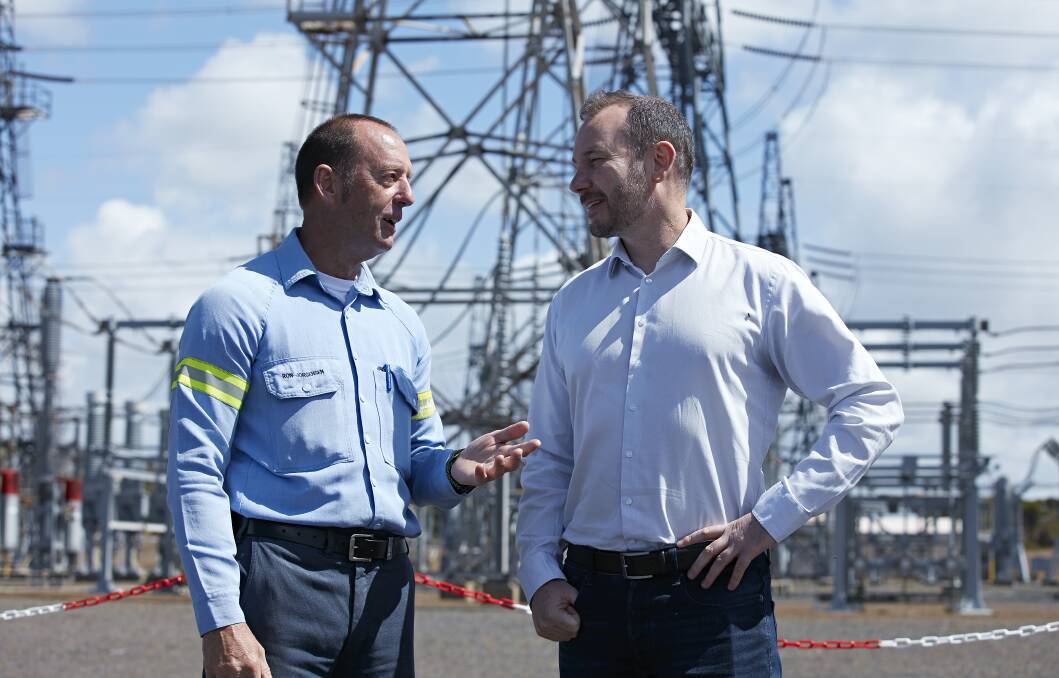 EXCITING OPPORTUNITY: Portland Aluminium Smelter manager Ron Jorgensen talks to Alinta Energy head of project development Kris Lynch about the proposed wind farm.