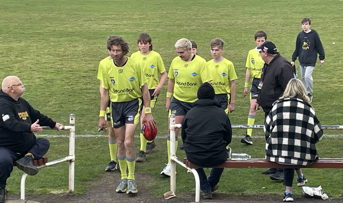 Central Paul Schurring leads the umpires off the ground after the WDFNL reserves second semi-final last Saturday.