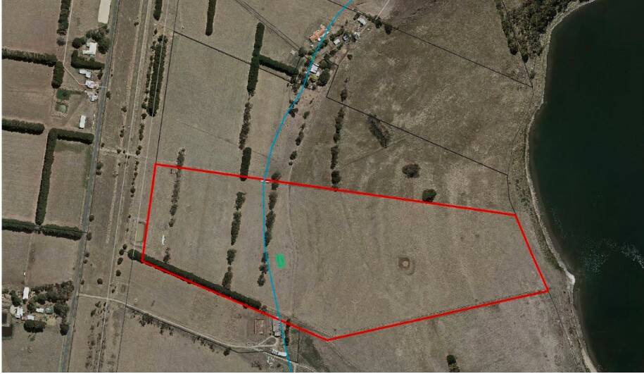 The green rectangle is where the proposed dwelling was earmarked for construction. 