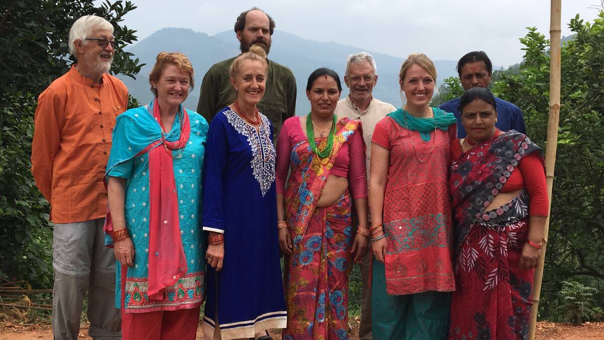 All smiles: Nepal Open Heart Appeal members and villagers at Aapghari to officially hand over the new community centre.