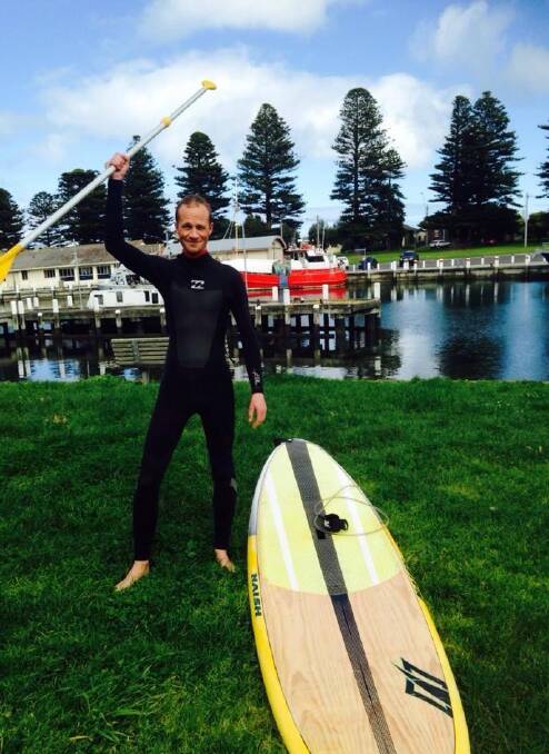 Ready: Dustin Neate will paddle board across Port Phillip Bay on Saturday.