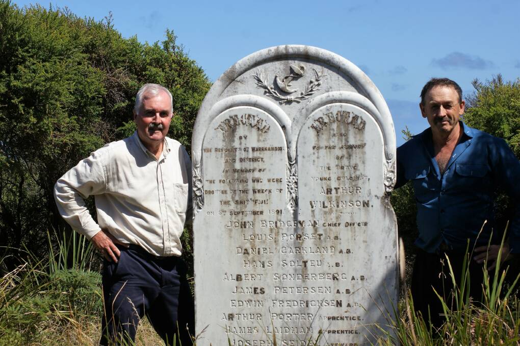 A STEP BACK IN TIME: Alan McLean and his friend Brian Salmon at the Moonlight Head cemetery. 