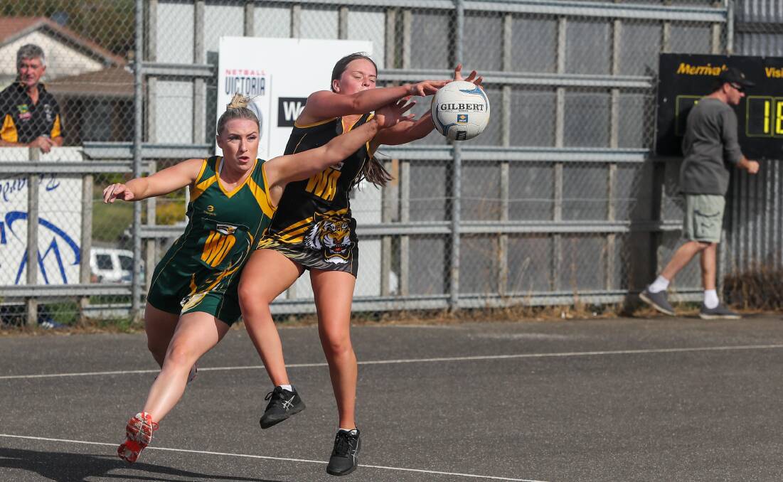 Playing well: Old Collegians wing defence Meagan Forth tries to stop Merrivale wing attack Eliza Ljubic from receiving the ball. Coach Carly Peake says Ljubic has been a good contributor in recent matches. Picture: Rob Gunstone