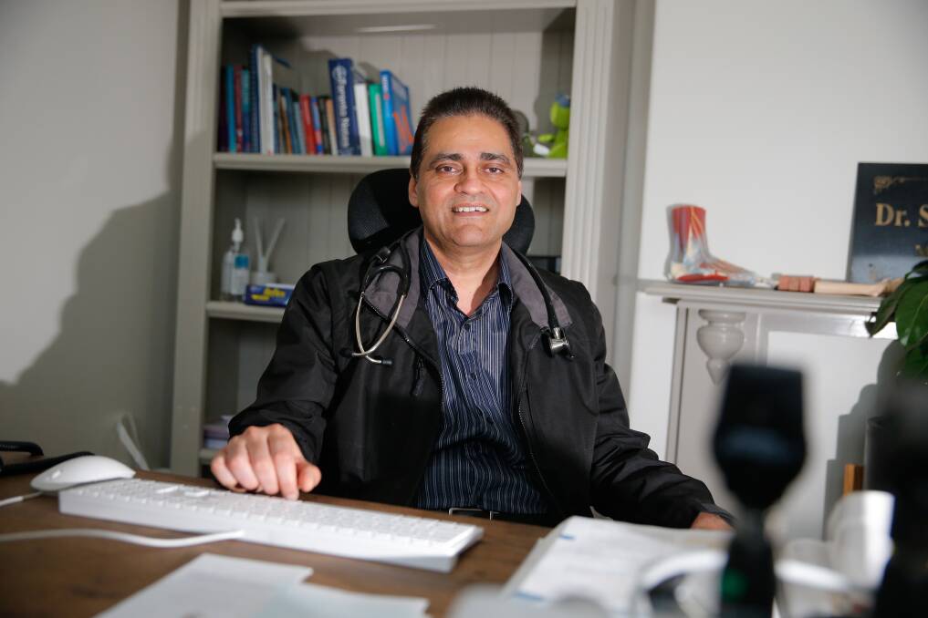 HIGH HOPES: Dr Surinder Singh in his office at the King Street Medical Centre. Picture: Mark Witte