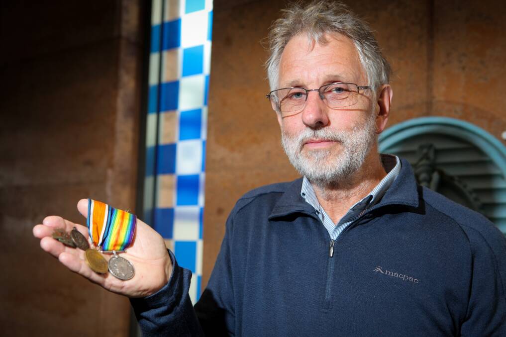 Family history: Geoff De La Rue wears his grandfather's WWI service medals every Anzac Day. Picture: Rob Gunstone