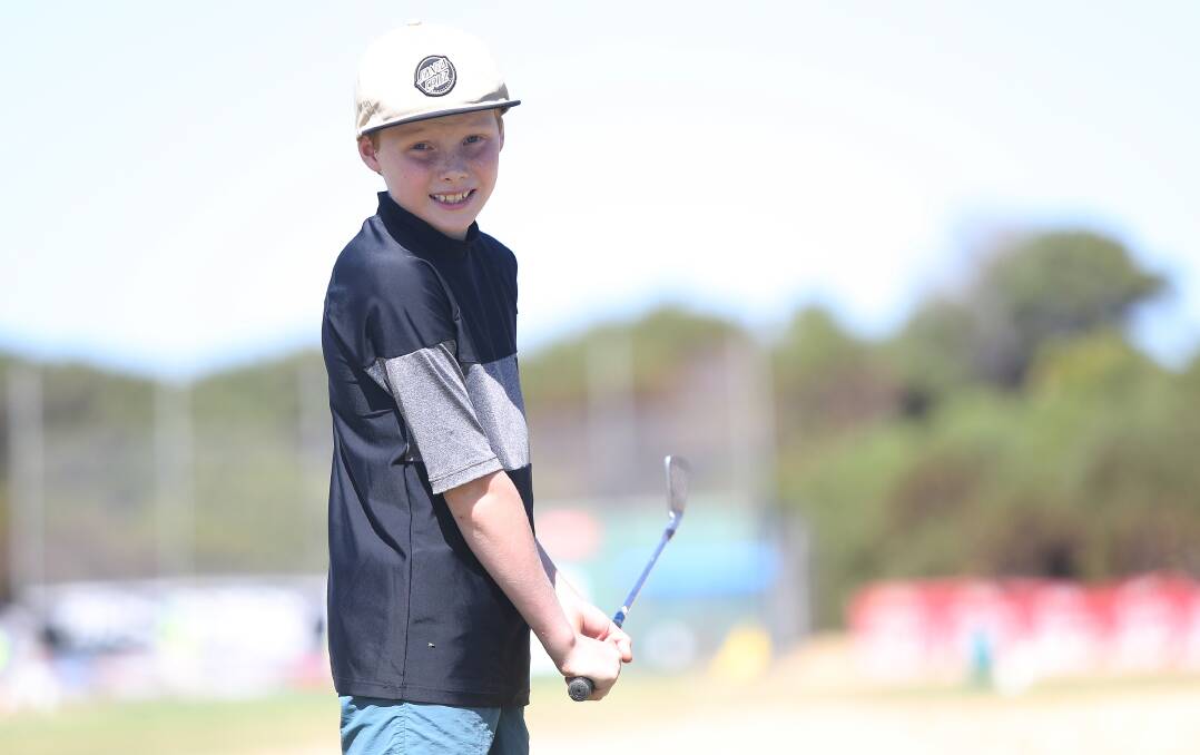 TOP SHOT: Harry Ashton, 10, hit a hole in one at the Rotary Club of Warrnambool East's fundraiser in the junior category. Pictures: Mark Witte