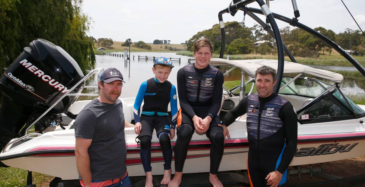 Team: Cobden-based barefoot water-skiers Brett Roberts and his son Harry, 8, and Glenfynes Peter Roberts and his son Thomas, 15, before training at Boggy Creek. Picture: Mark Witte