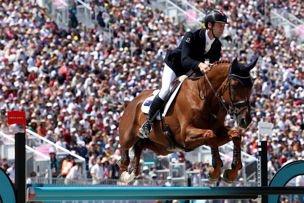 Australian equestrian rider Christopher Burton and horse Shadow Man during the final day of Olympic eventing on Monday. Picture Getty Images 