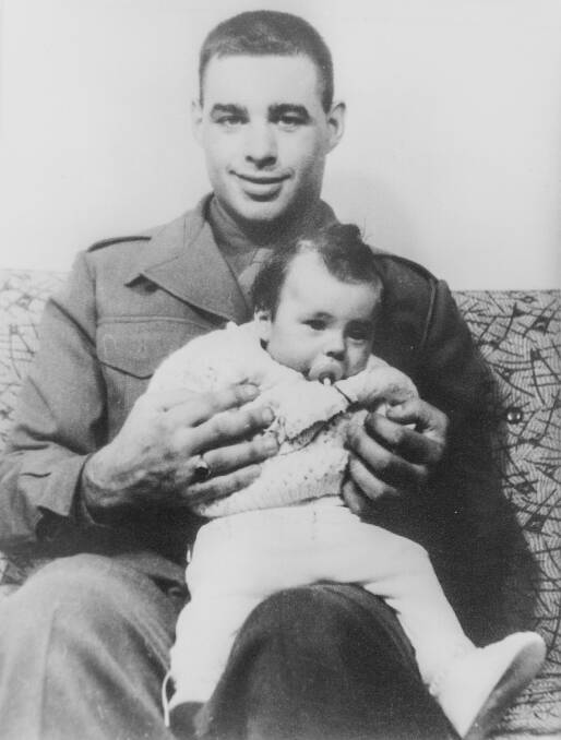 Private William Carroll pictured here with his young son David before he shipped out to Vietnam. 