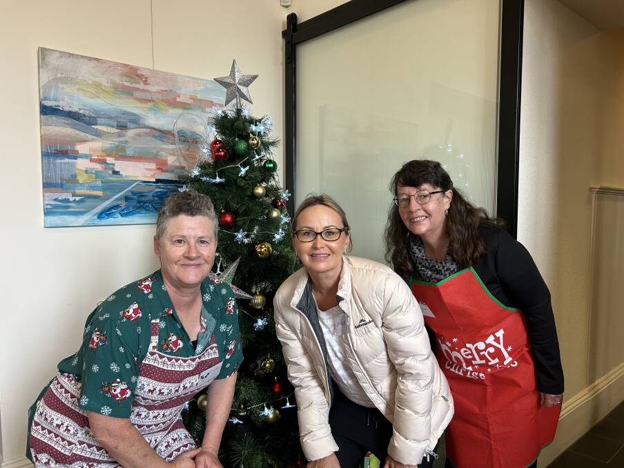 Warrnambool's Linda Wright, Nicole Chaffey and Louise Endean who volunteered at this year's Community Christmas Lunch. Picture by Jessica Howard