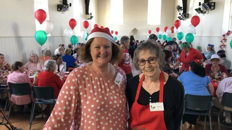 Warrnambool's community Christmas lunch volunteers Lois Johnson and Mary Lancaster at the 2019 event. Picture file