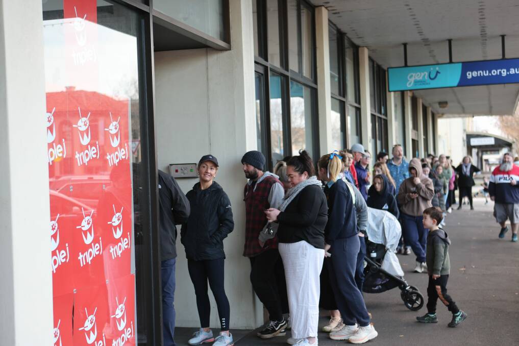 It didn't take long for dozens of people to join the queue for tickets. Picture by Anthony Brady