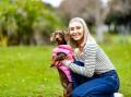 Warrnambool's Brianna Greene with her dog Florence ahead of the Dachshund Dash in Port Fairy. Picture by Anthony Brady