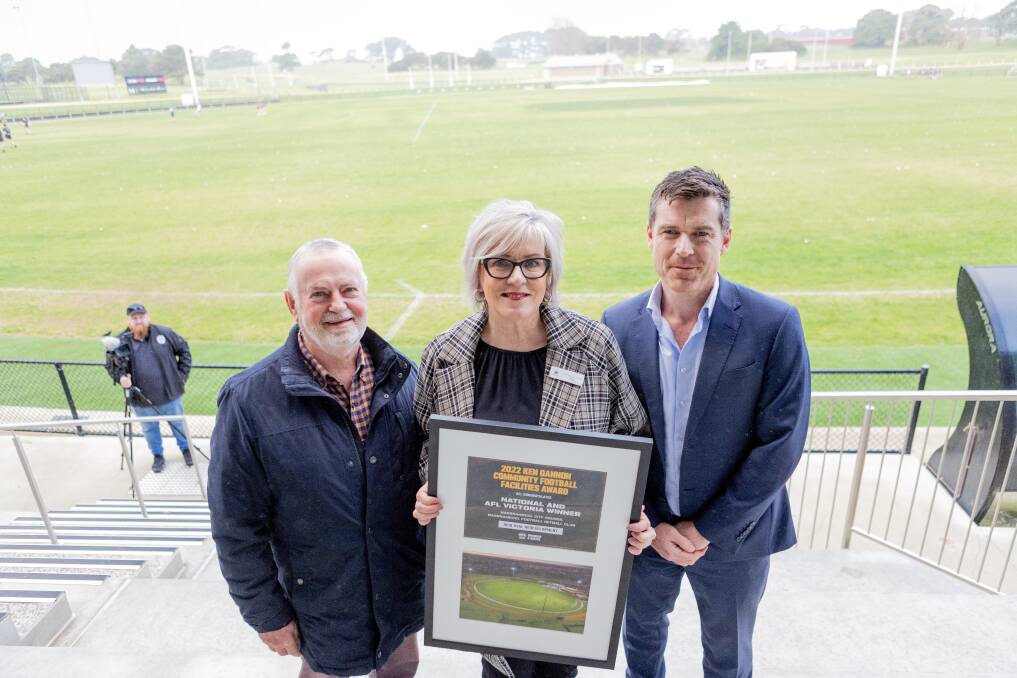 Ken Gannon, Warrnambool mayor Debbie Arnott and the AFL's Ben Kavenagh at the announcement of Reid Oval as an award-winning venue. Picture by Anthony Brady