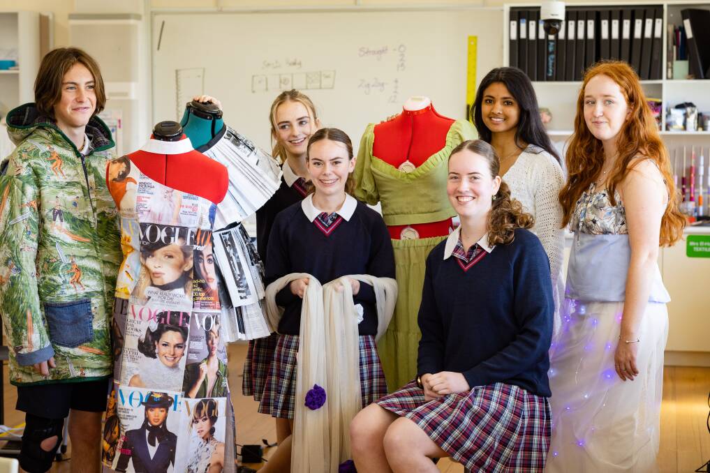 Emmanuel College year 11 textiles students Theo Kane, Ellie Holden, Nikayla Purcell, Layla Thom, Keiara Perera and Georgia Black with their creations ahead of the F Project's Fabric of Life Festival on October 28, 2023. Picture by Sean McKenna.