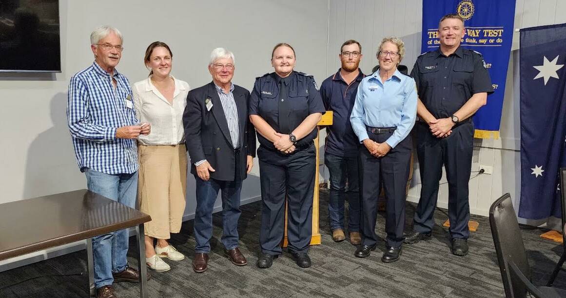 Senior Constable Mel Gray was awarded the Rotary Club of Warrnambool East's 2023 Dr John Birrell award. Pictured with Bill Hewett and other members of the rotary club, as well as police Sergeant Danny Brown.