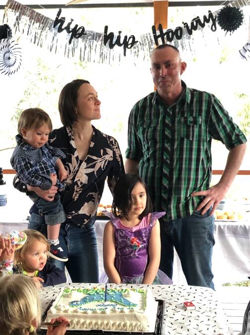 Cath Rushbrooke with her late husband Paul and their children George and Isabella at George's first birthday. Picture supplied