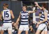 Camperdown's Hamish Sinnott (middle) celebrates a goal for Geelong's VFL side with fellow Hampden league exports George Stevens and Gary Rohan. Picture by Geelong Cats 