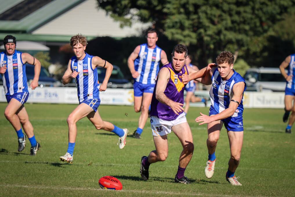 Port Fairy's Dylan Gunning and Hamilton Kangaroos' Hamish Cook vie for the ball. Picture by Justine McCullagh-Beasy 