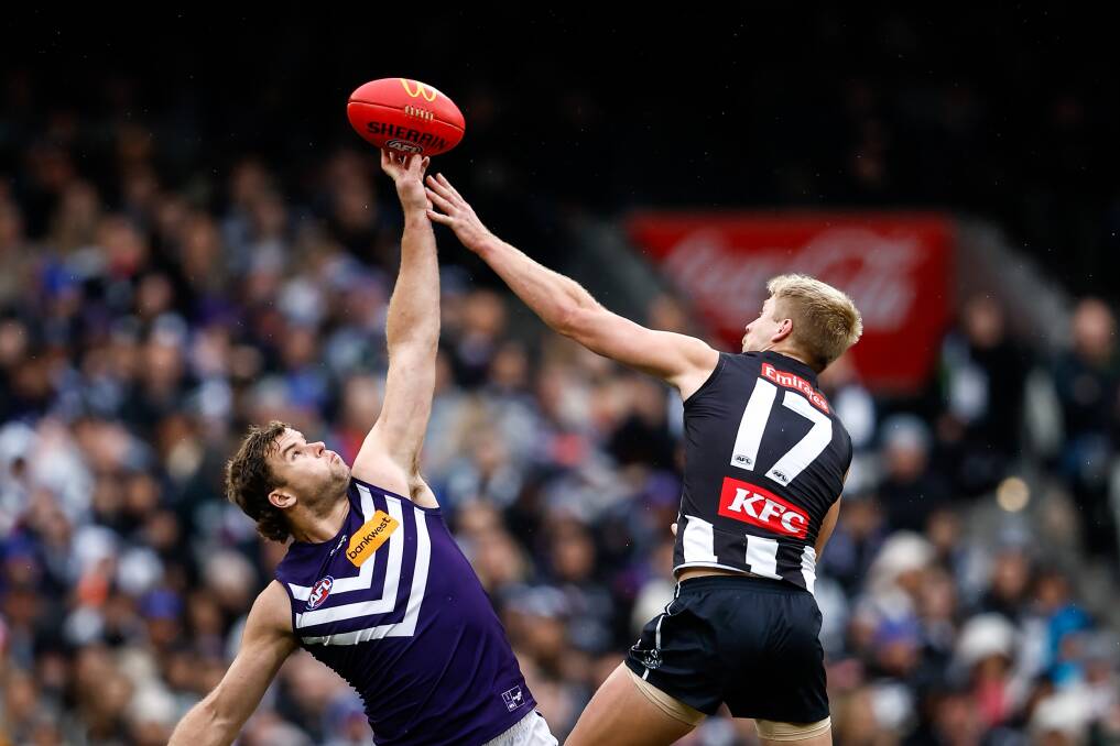 Fremantle's Sean Darcy rucks against Collingwood's Billy Frampton in the game he was injured. Picture by Getty Images 