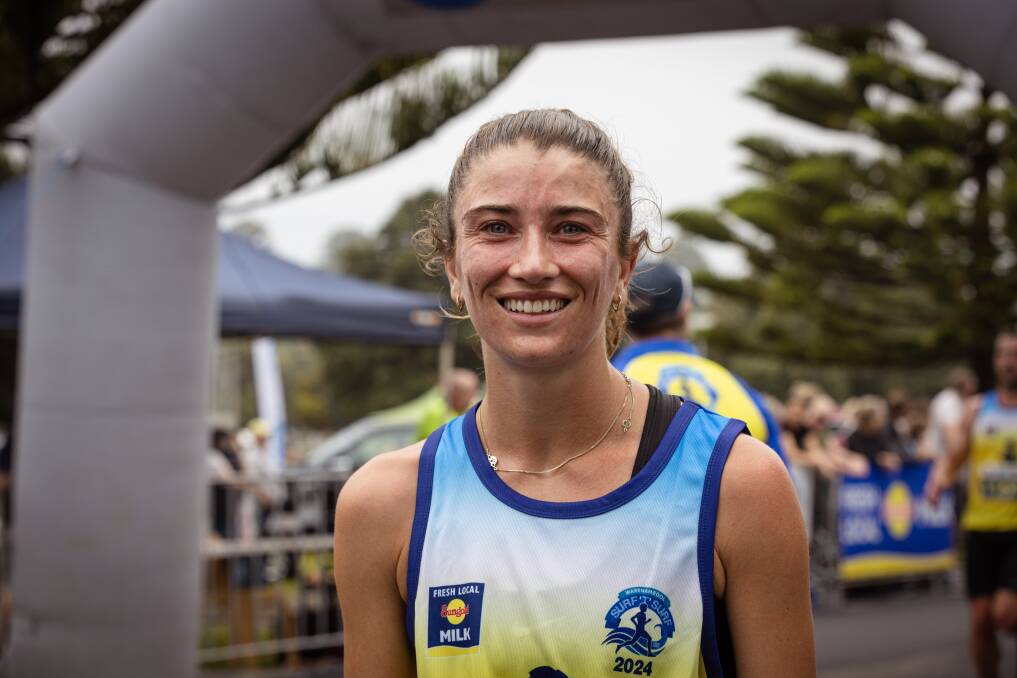 Sarah Adam was all smiles after winning the 2024 Surf T Surf 10km women's event. Picture by Sean McKenna 