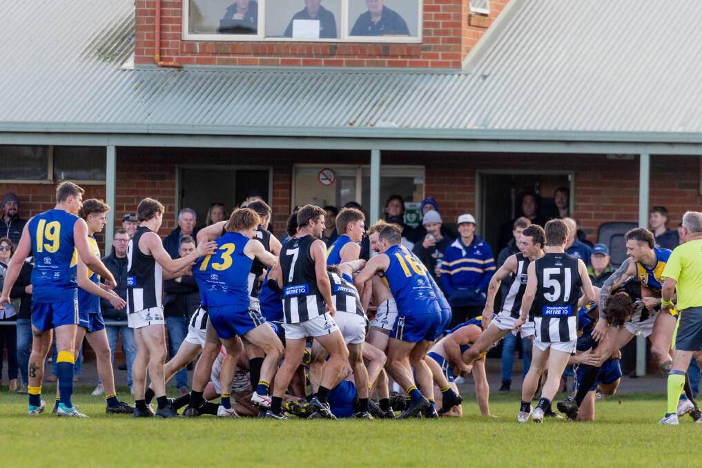 A melee breaks out between North Warrnambool Eagles and Camperdown in the second term. Picture by Anthony Brady 