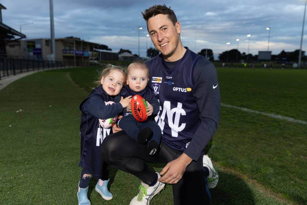 Warrnambool footballer Sam Cowling with children Matilda, 2, and Cooper, eight months, ahead of his 200th senior game. Picture by Eddie Guerrero 
