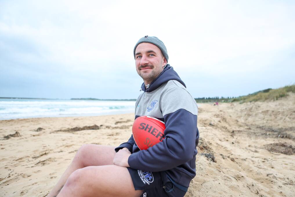 Darcy Graham, pictured on Warrnambool's beach on Monday, will celebrate a football milestone on Saturday. Picture by Anthony Brady 