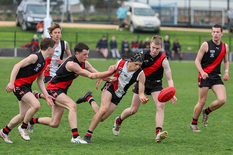 Koroit's Des O'Keefe (middle) during the Hampden league under 16 grand final in 2023. Picture by Eddie Guerrero 