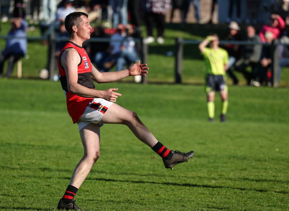 Tom Spokes kicks a goal for Cobden in the elimination final. Picture by Sean McKenna 