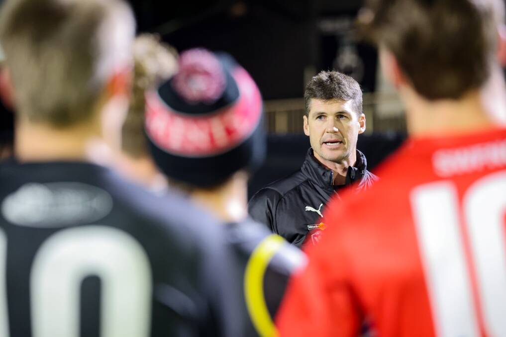 AFL great Jonathan Brown addresses Hampden league's under 23 players at training in Warrnambool on Thursday night. Picture by Anthony Brady 