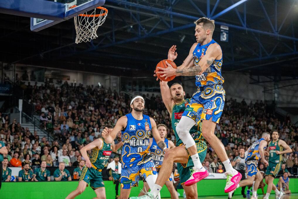 Brisbane's Nathan Sobey gets some airtime against Tasmania during the 2023-24 NBL season. Picture by Paul Scambler/The Examiner 