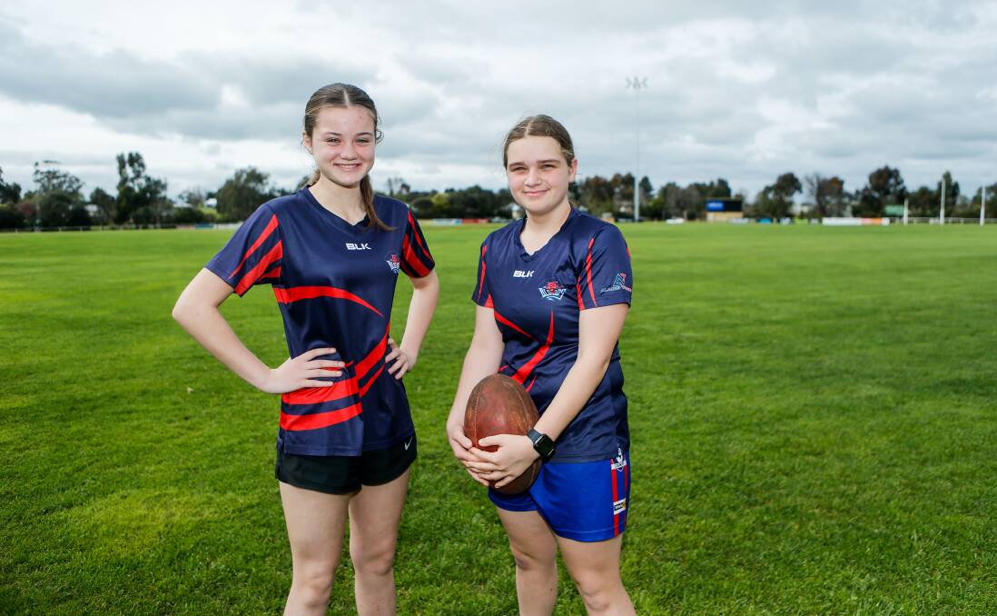 Terang Mortlake junior footballers Molly Kavenagh and Annabelle Glossop are among those who can take inspiration from an AFLW game in Warrnambool. Picture by Anthony Brady 
