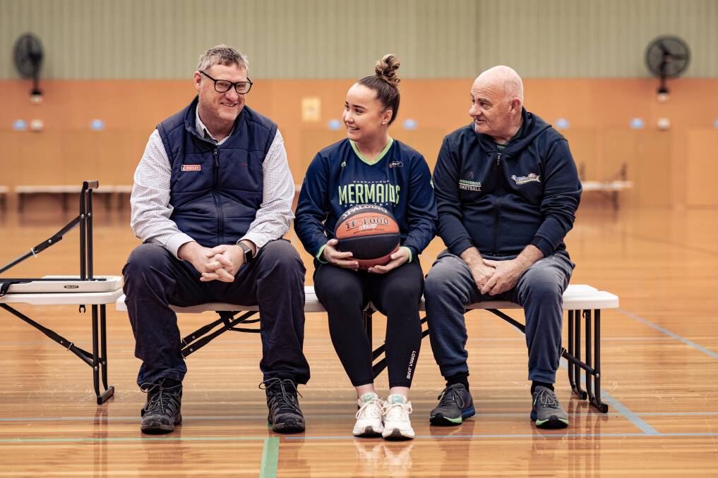 Former Big V player Stephen Vaughan, current player Mia Mills and long-time coach Lee Primmer. Picture by Sean McKenna 