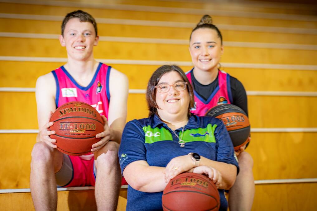 Warrnambool Basketball's Jess Bonham (middle) will shave her head for charity on Saturday, May 25. She is pictured with players Harry McGorm and Mia Mills. Picture by Eddie Guerrero 