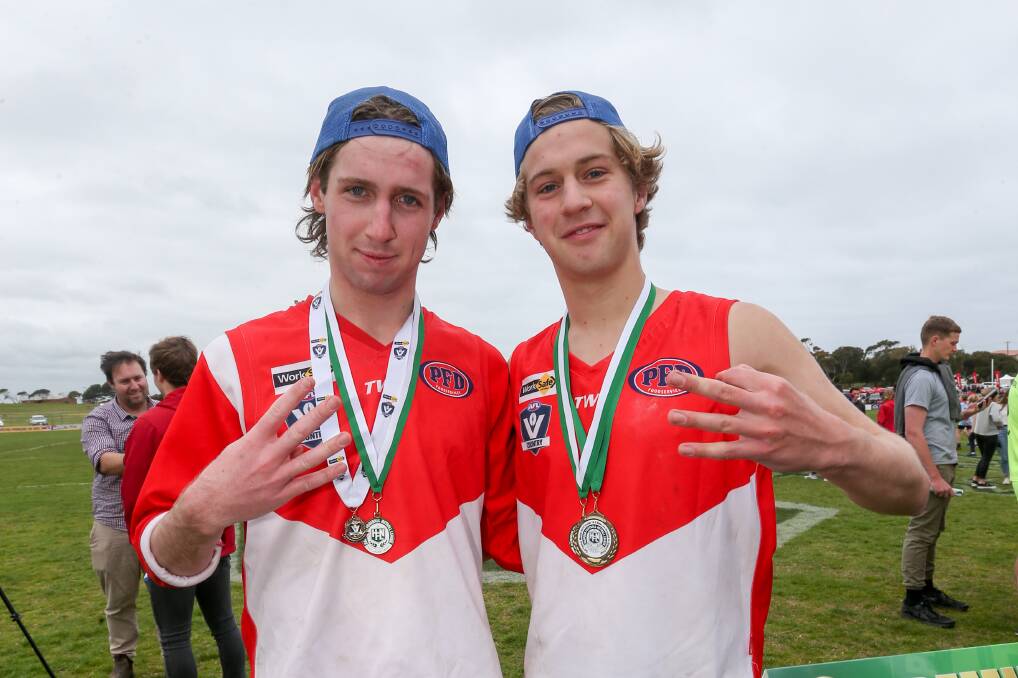 Brothers Flynn Atchison and Cooper Atchison after winning a Hampden league under 18.5 premiership with South Warrnambool in 2018. File picture 