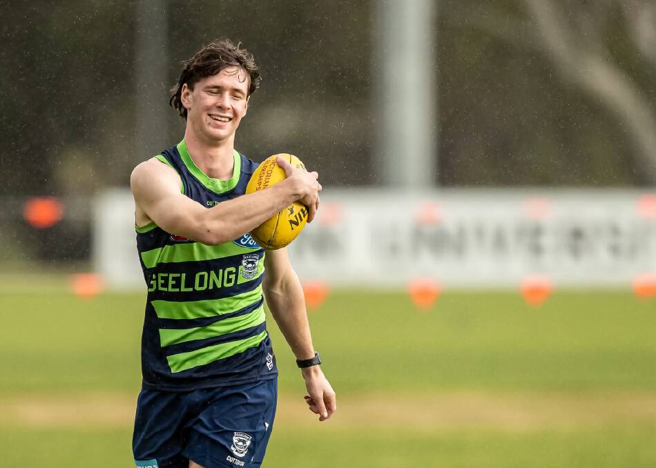 Ryley Hutchins is all smiles as he trains with Geelong. Picture by Arj Giese 