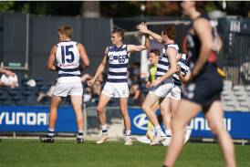 Camperdown's Hamish Sinnott (middle) celebrates a goal for Geelong's VFL side with fellow Hampden league exports George Stevens and Gary Rohan. Picture by Jack Mirrielees /Geelong Cats 