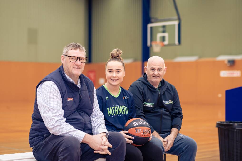 Former Big V player Stephen Vaughan, current player Mia Mills and long-time coach Lee Primmer. Picture by Sean McKenna 