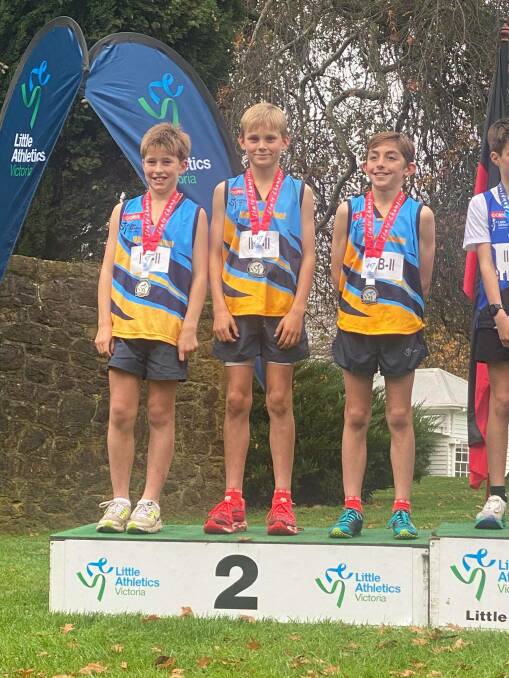 Warrnambool Little Athletics' Daniel Roberts, Beau Morrison and Harrison Watson on the Victorian under 11 boys' cross-country podium. Picture supplied 