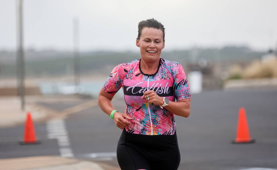 Emma Watty completes the run leg at the Warrnambool foreshore tri earlier this year. Picture by Anthony Brady 