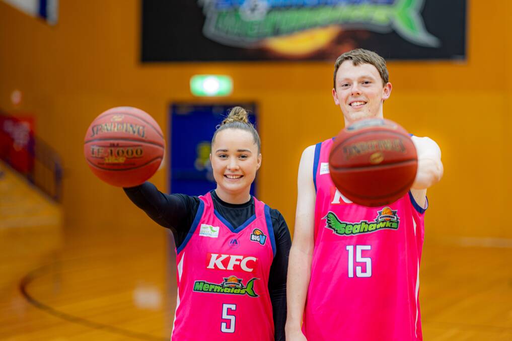 Warrnambool basketballers Mia Mills and Harry McGorm in the club's pink uniform. Picture by Eddie Guerrero 