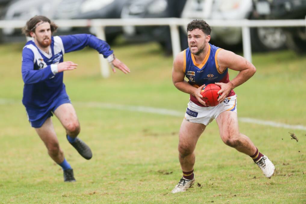 OUT OF REACH: South Rovers, including Trent Harman (pictured), are hoping to keep Russells Creek at bay in the race for finals. Picture: Chris Doheny