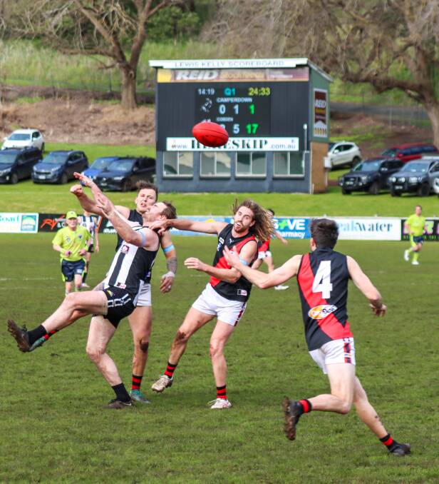 Sam Gordon (front) and Sam Thow (middle) fight for an incoming ball. Picture by Justine McCullagh-Beasy 