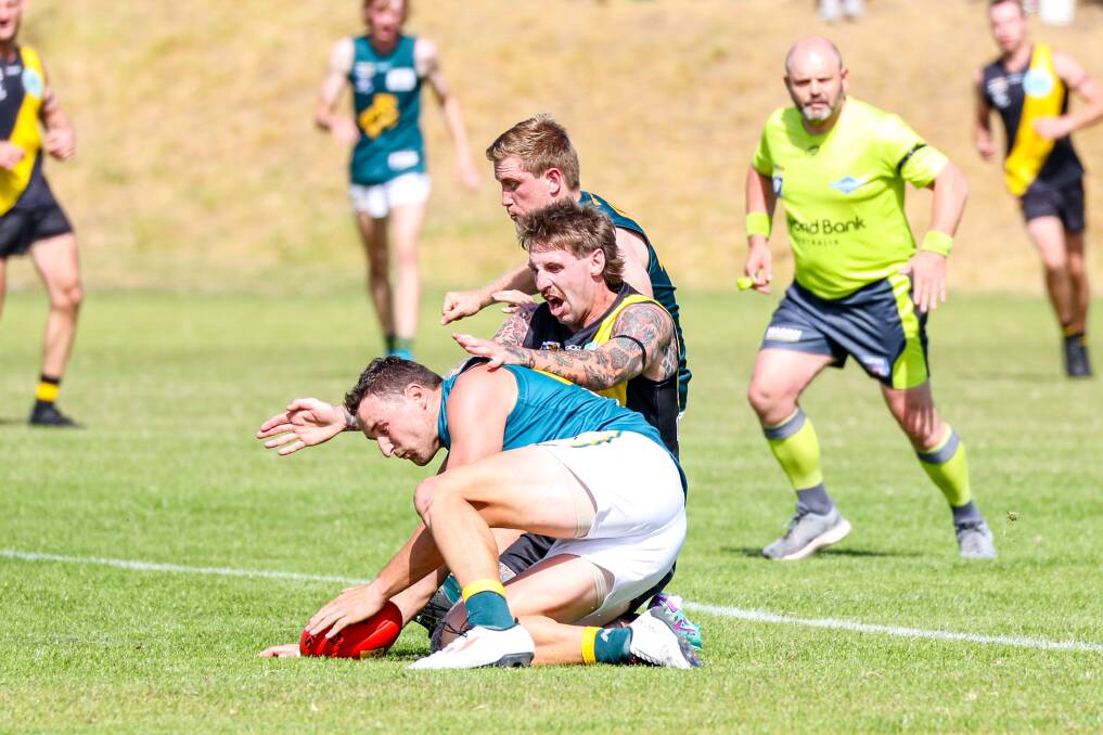 Merrivale's Flynn Atchison lays a tackle against Old Collegians. Picture by Eddie Guerrero 