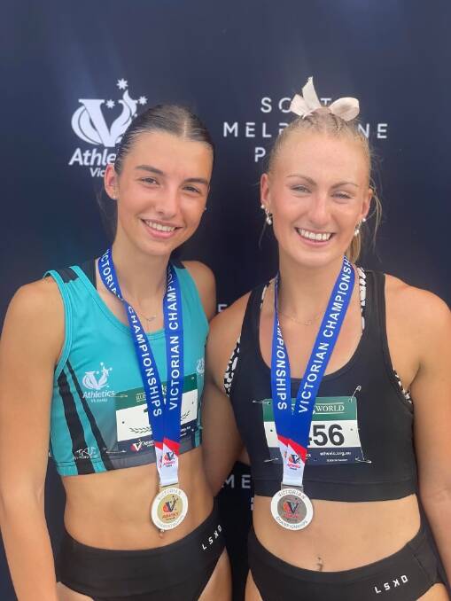 Bella Pasquali (first) and Warrnambool's Layla Watson (second) after their Athletics Victoria track and field championships under-20 400m final. Picture supplied 